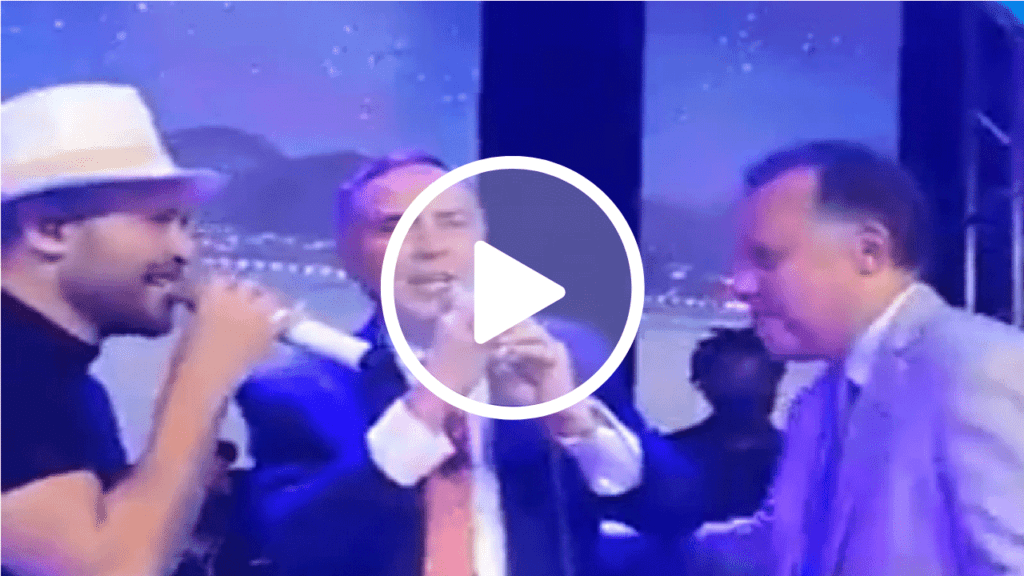 Sem máscara, Barroso canta e dança ao lado de Diogo Nogueira e jornalista da Globo